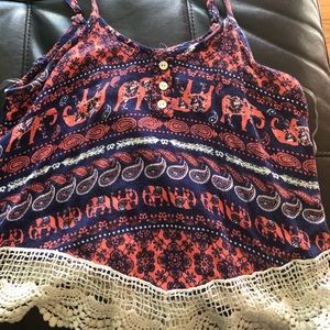 Loose fitted tank top.